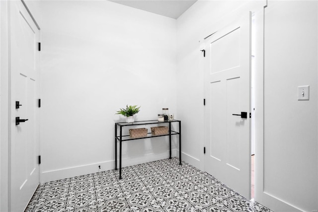 entryway featuring light tile floors