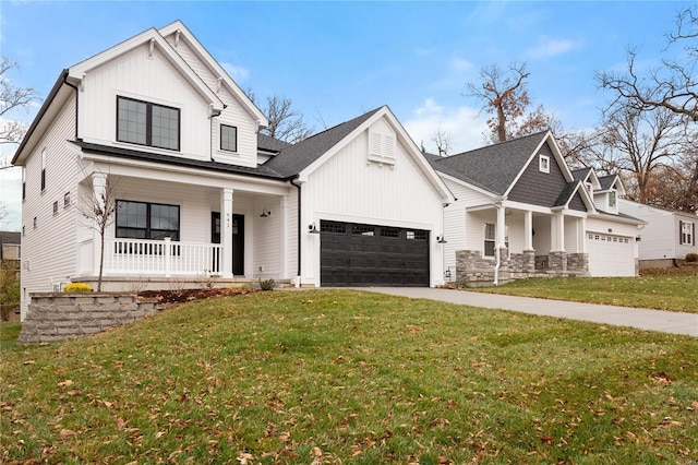 modern farmhouse with a front yard and a porch