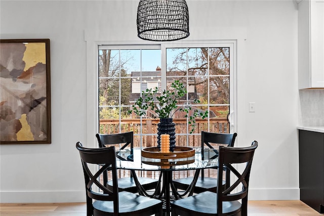 dining space featuring light hardwood / wood-style flooring