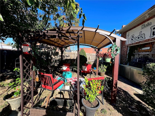 view of terrace featuring a pergola