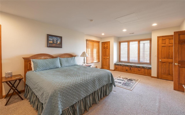 bedroom with light carpet