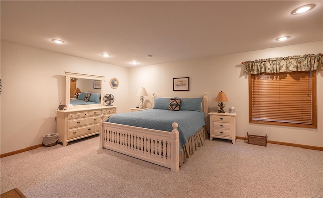 bedroom featuring light carpet