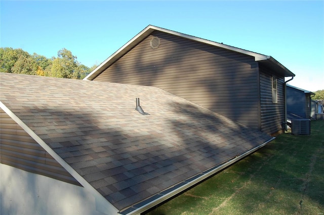 view of home's exterior with central AC unit