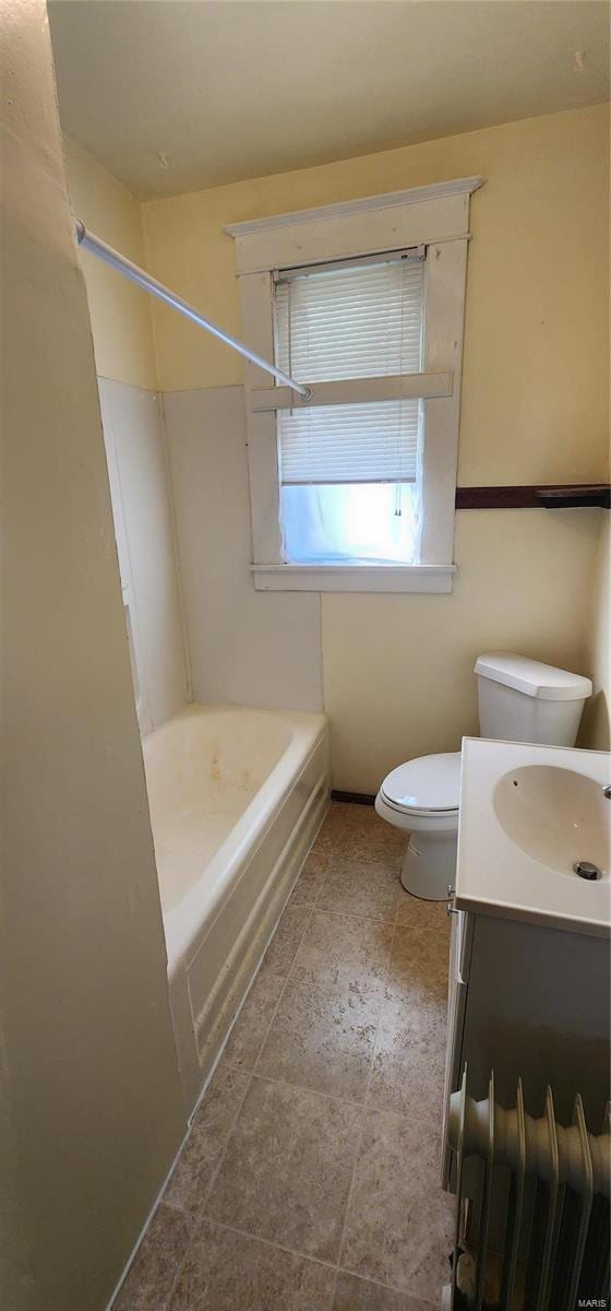 full bathroom featuring shower / washtub combination, radiator, tile flooring, toilet, and vanity