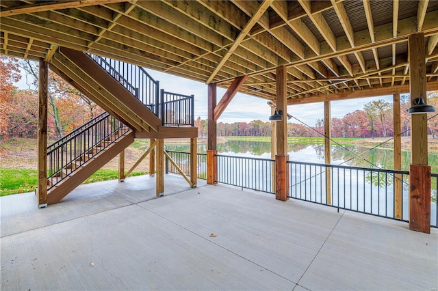 view of patio / terrace featuring a deck with water view