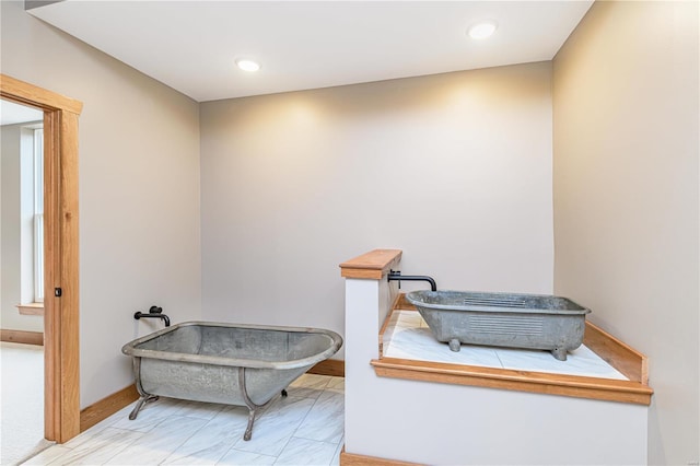 bathroom with tile patterned floors