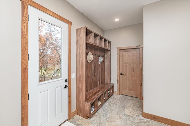 mudroom with light tile patterned flooring