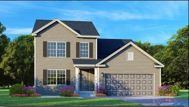 view of front of house featuring a front yard and a garage