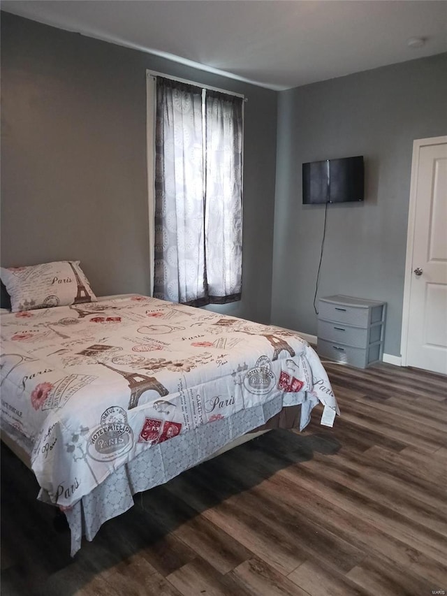 bedroom featuring hardwood / wood-style floors