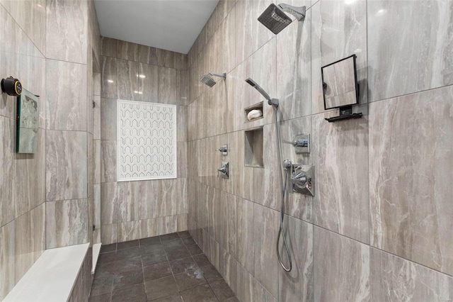 bathroom featuring tiled shower and tile walls