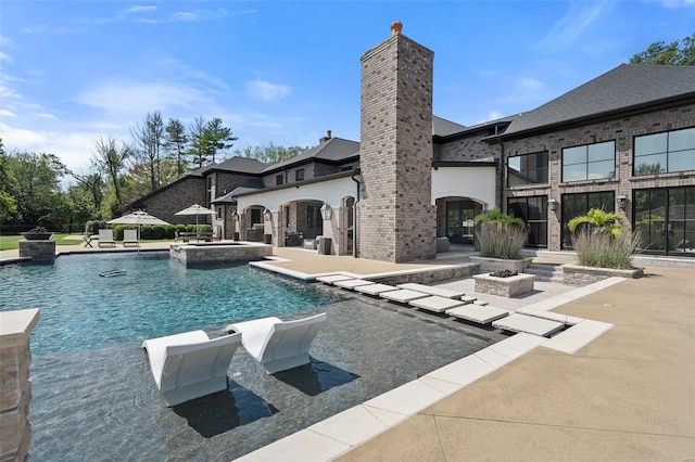 view of swimming pool featuring a patio area