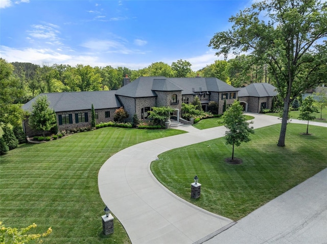 view of front of home with a front lawn