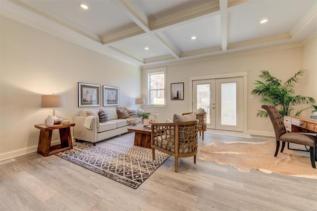 living room with light hardwood / wood-style flooring, french doors, beam ceiling, coffered ceiling, and ornamental molding