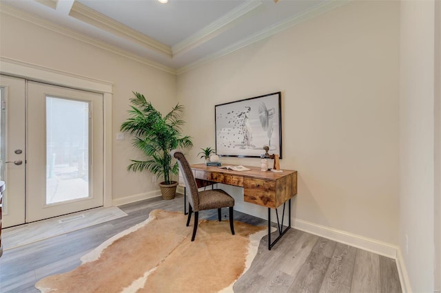 office area featuring a raised ceiling, hardwood / wood-style flooring, french doors, and crown molding