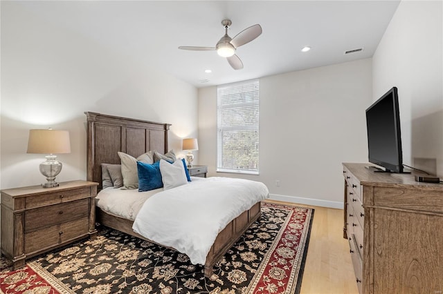 bedroom featuring ceiling fan and light wood-type flooring