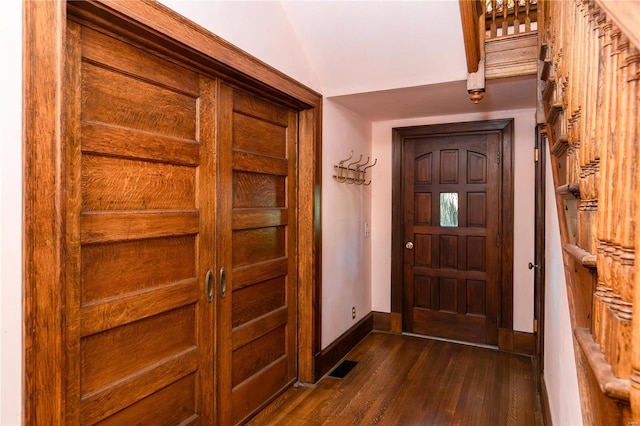 doorway to outside featuring dark hardwood / wood-style flooring