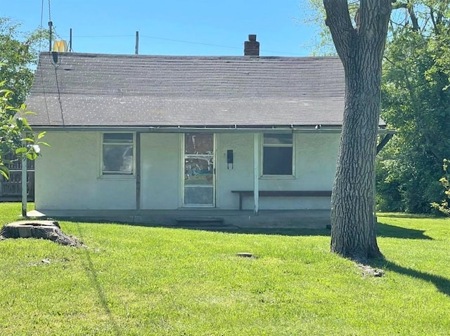 view of front of house with a front yard