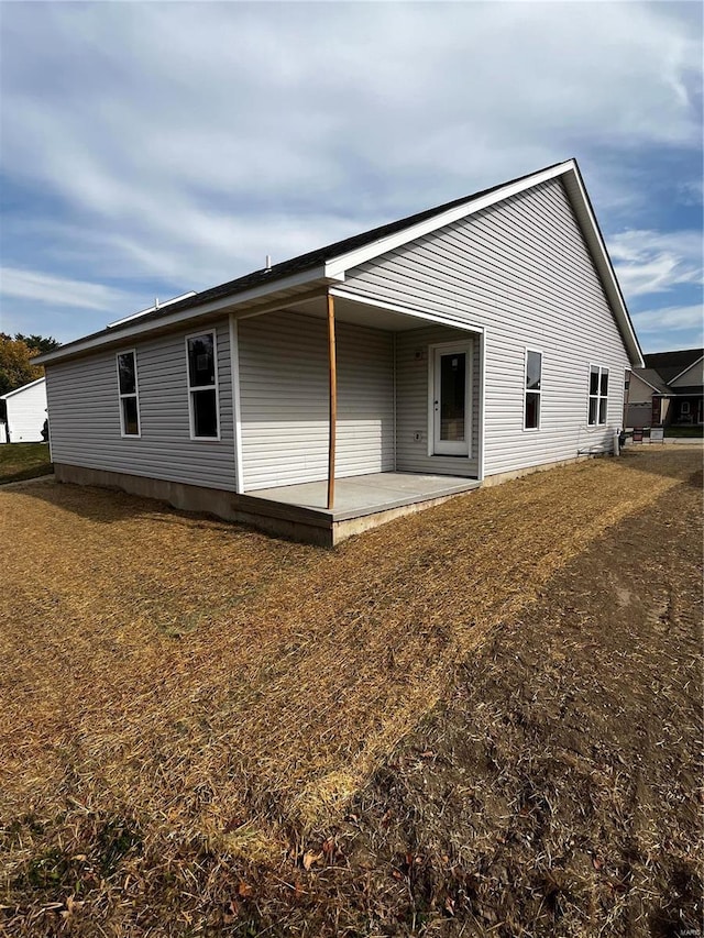 back of house featuring a patio