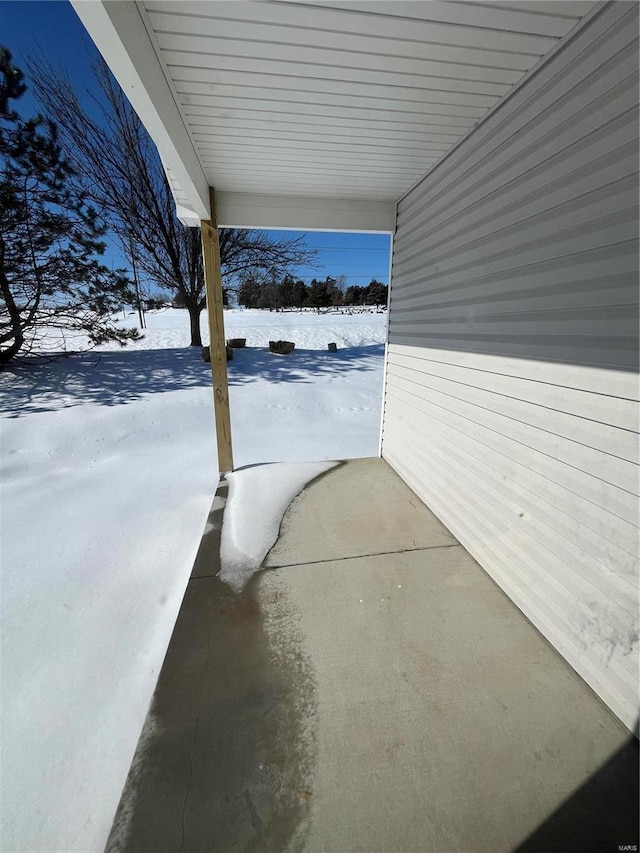 view of snow covered patio