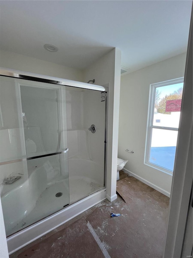 bathroom featuring an enclosed shower