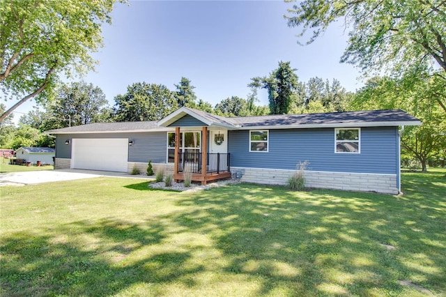 ranch-style house featuring a garage and a front lawn