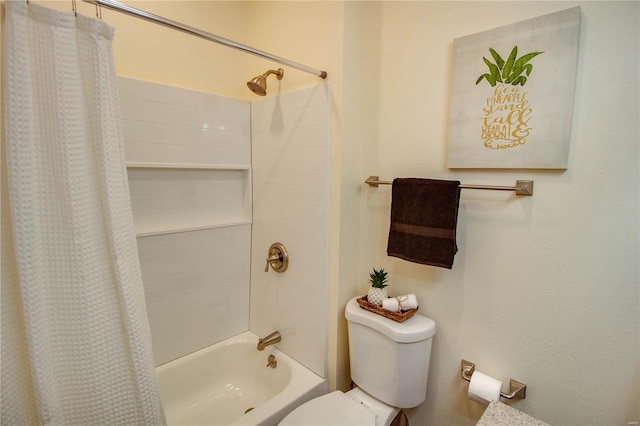 bathroom featuring toilet and shower / tub combo