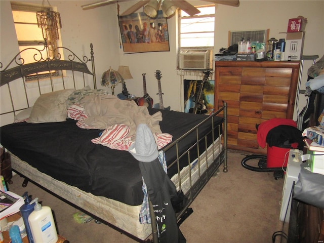 bedroom featuring cooling unit and carpet