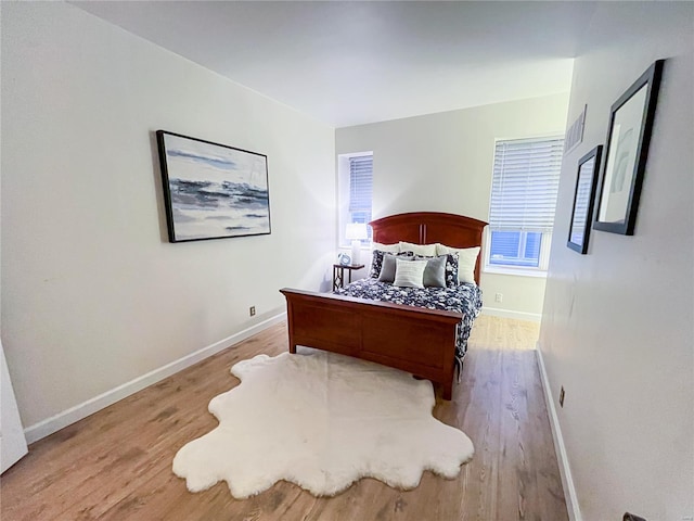 bedroom featuring hardwood / wood-style floors