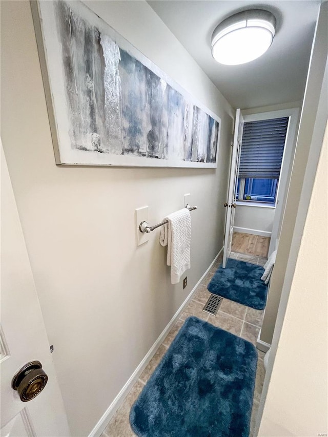 bathroom with tile patterned flooring