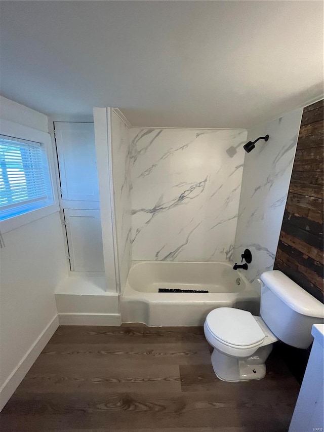 full bathroom featuring shower / washtub combination, toilet, vanity, and hardwood / wood-style floors