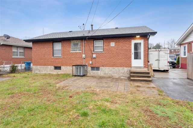 back of house with a patio and cooling unit