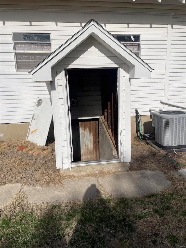 doorway to property with cooling unit