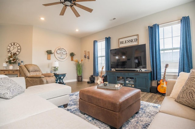 living room with ceiling fan, recessed lighting, wood finished floors, and baseboards