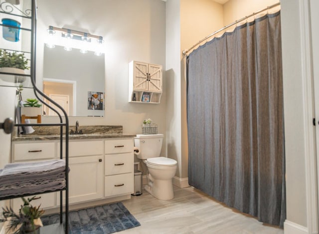 full bath with toilet, curtained shower, wood finished floors, and vanity