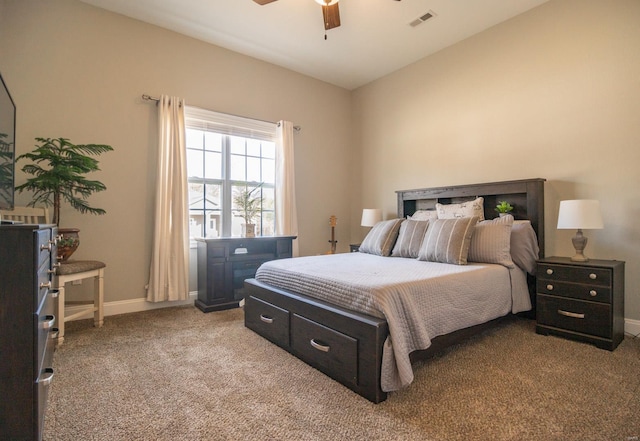 bedroom featuring visible vents, baseboards, ceiling fan, carpet, and vaulted ceiling