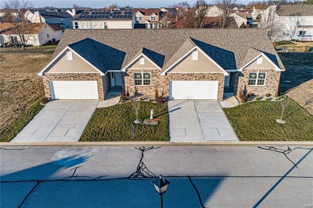 ranch-style house featuring a garage