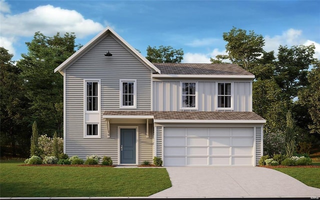 view of front of home featuring a front yard and a garage