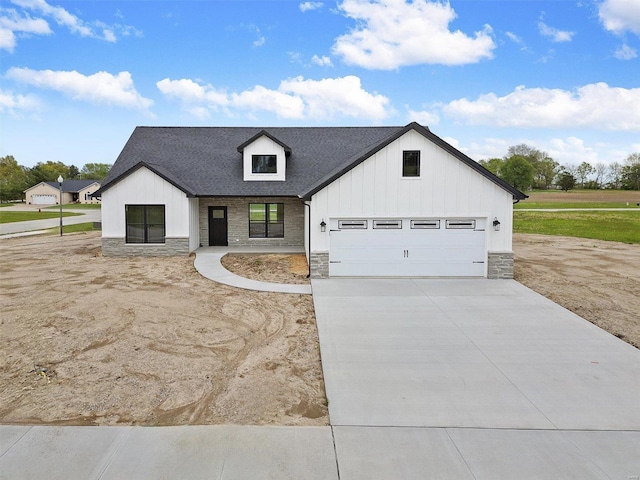 modern farmhouse style home featuring a garage