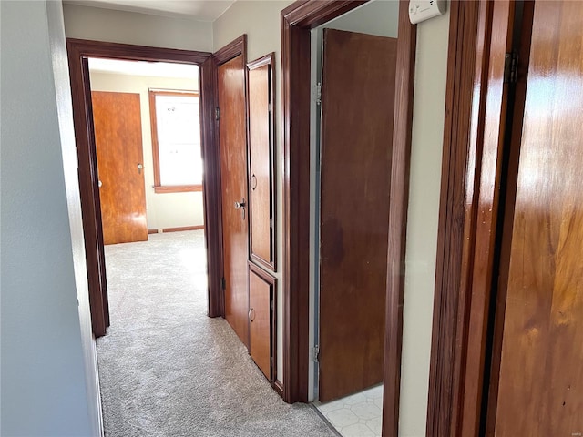 corridor with light colored carpet