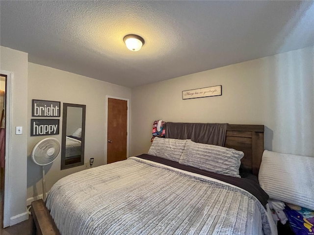 bedroom with a textured ceiling