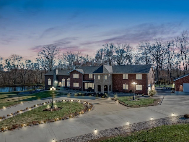 view of front of home with a yard