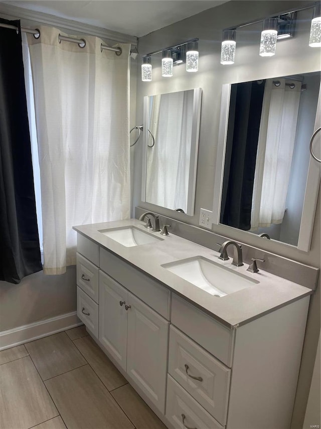 bathroom featuring dual vanity and tile patterned floors