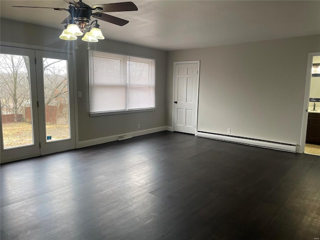 unfurnished room featuring a baseboard radiator, dark hardwood / wood-style floors, and ceiling fan