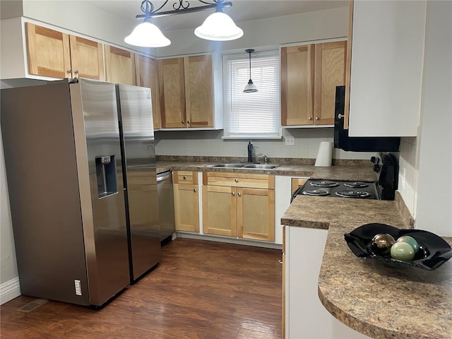 kitchen with decorative light fixtures, tasteful backsplash, stainless steel appliances, sink, and dark hardwood / wood-style floors