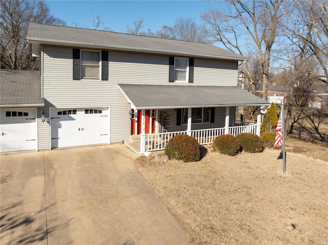 view of front facade featuring covered porch and a garage