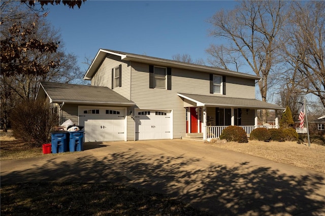 view of front of home with a porch and a garage