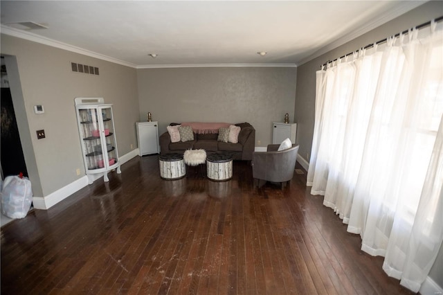 living room with crown molding and dark wood-type flooring