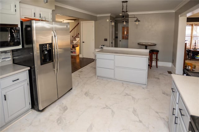 kitchen with decorative light fixtures, white cabinetry, light tile floors, black microwave, and stainless steel refrigerator with ice dispenser