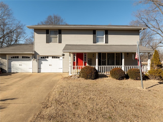 view of front of house with covered porch and a garage