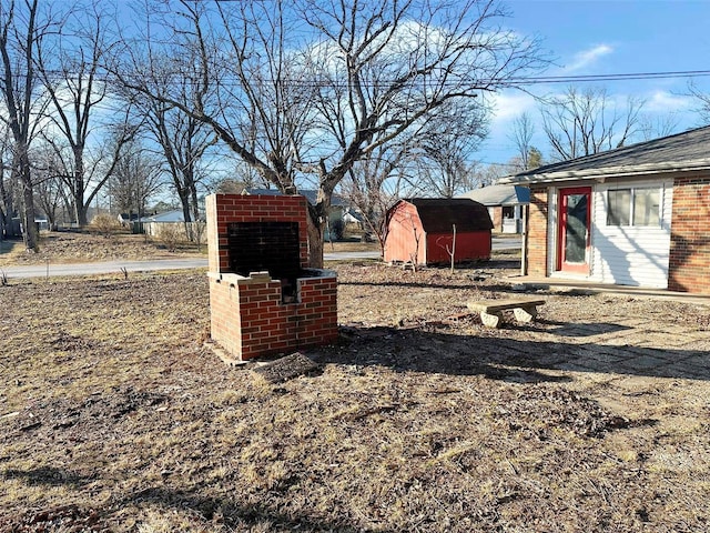 exterior space featuring a storage shed